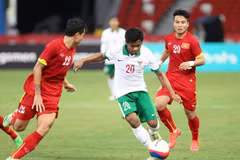 Các cầu thủ Indonesia (áo trắng) bị nghi bán độ ở trận gặp U23 Việt Nam. (Ảnh: Quốc Khánh/TTXVN)