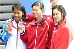 Ánh Viên (giữa) đã thi đấu hết các nội dung ở SEA Games 28. (Ảnh: Quốc Khánh/TTXVN)