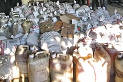 Bắt quả tang một cơ sở đang chế biến mỡ bẩn tại tỉnh Hà Tĩnh