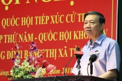 Bộ trưởng Bộ Công an Tô Lâm phát biểu tại buổi tiếp xúc cử tri. (Ảnh: Diệp Trương/TTXVN)