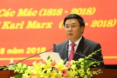 Giáo sư-tiến sỹ Nguyễn Xuân Thắng, Bí thư Trung ương Đảng, Chủ tịch Hội đồng Lý luận Trung ương, Giám đốc Học viện Chính trị quốc gia Hồ Chí Minh phát biểu. (Ảnh: Dương Giang/TTXVN)