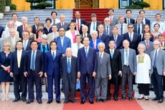 Chủ tịch nước Trần Đại Quang tiếp các nhà khoa học quốc tế nhân dịp sang Việt Nam dự Hội thảo Khoa học để phát triển. (Ảnh: Nhan Sáng/TTXVN)