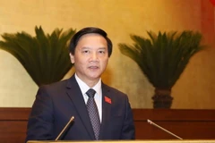 Chủ nhiệm Ủy ban Pháp luật của Quốc hội Nguyễn Khắc Định trình bày Báo cáo giải trình, tiếp thu, chỉnh lý dự án Luật Tố cáo (sửa đổi). (Ảnh: Phương Hoa/TTXVN)