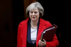 Thủ tướng Anh Theresa May tới dự phiên họp chất vấn tại Nghị viện ở London ngày 23/11. (Nguồn: AP/TTXVN)