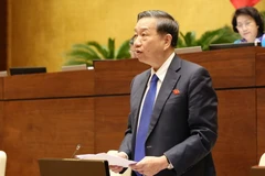 Thượng tướng, Bộ trưởng Bộ Công an Tô Lâm giải trình ý kiến của đại biểu Quốc hội. (Ảnh: Phương Hoa/TTXVN)