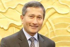 Một góc trung tâm Singapore về đêm. Ảnh minh họa.