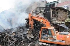 Hiện trường vụ cháy. (Ảnh: Hùng Võ/Vietnam+)