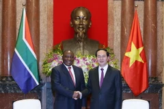 Chủ tịch nước Trần Đại Quang tiếp Phó Tổng thống Nam Phi Cyril Ramaphosa. (Ảnh: Nhan Sáng/TTXVN)