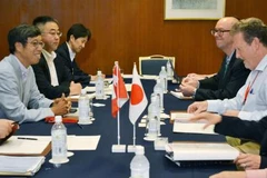 Các nhà đàm phán Nhật Bản và Canada thảo luận về TPP ở Tokyo, Nhật Bản ngày 12/7. (Nguồn: Kyodo/TTXVN)