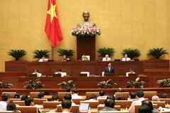 Bộ trưởng Bộ Văn hóa, Thể thao và Du lịch trả lời chất vấn đại biểu Quốc hội chiều 5/6. (Ảnh: TTXVN)