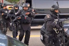 Cảnh sát Boston đang tìm kiếm nghi phạm trong vụ nổ súng. (Nguồn: Boston Globe)