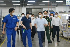 Phó Thủ tướng Vũ Đức Đam kiểm tra hoạt động sản xuất tại TP.HCM