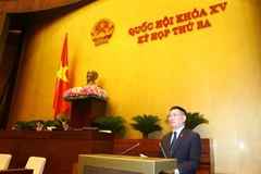 Bộ trưởng Bộ Tài chính Hồ Đức Phớc trình bày Báo cáo quyết toán ngân sách nhà nước năm 2020. (Ảnh: Văn Điệp/TTXVN)