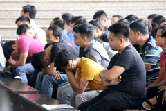 Các bị cáo tại phiên tòa. (Ảnh: Trung Kiên/TTXVN)