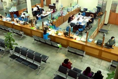 Hoạt động giao dịch thanh toán tại Kho bạc Nhà nước Hà Nội. (Ảnh minh họa: Hoàng Hùng/TTXVN)