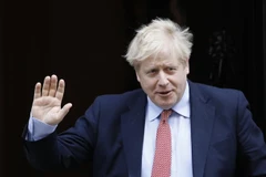 Thủ tướng Anh Boris Johnson sau cuộc họp tại nhà số 10 Phố Downing ở London ngày 18/3/2020. (Ảnh: AFP/TTXVN)