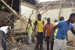 Hiện trường một vụ đánh bom ở Nigeria. (Ảnh: AP)