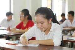 Thí sinh làm bài thi môn Lịch sử. (Nguồn: TTXVN)