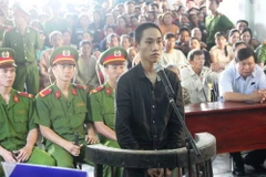 Bị cáo Nguyễn Văn Thái trước vành móng ngựa. (Ảnh: Tiên Minh/TTXVN)