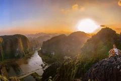 Bình minh trên đỉnh Hang Múa. (Ảnh: CTV)