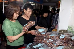 Khách tham quan hội chợ. (Ảnh minh họa: Thế Duyệt/TTXVN)