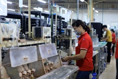 Tăng kết nối để doanh nghiệp trong nước tham gia chuỗi cũng ứng của doanh nghiệp FDI. (Ảnh: Đức Duy/Viẹtnam+)