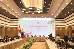Phiên họp báo do Văn phòng Chính phủ tổ chức tối 3/1. (Ảnh: Xuân Quảng/Vietnam+)
