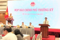 Bộ trưởng Chủ nhiệm Văn phòng Chính phủ Trần Văn Sơn thông tin về tình hình kinh tế-xã hội 7 tháng. (Ảnh: Đức Duy/Vietnam+)