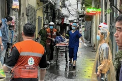 Vụ cháy chung cư mini tại ngách 29/70 phố Khương Hạ, quận Thanh Xuân. (Ảnh: Phạm Kiên/TTXVN)