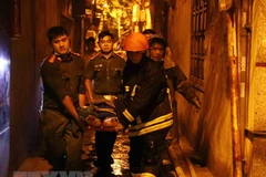 Vụ cháy xảy ra tại trọng tại số nhà 37 ngách 29/70 phố Khương Hạ, quận Thanh Xuân. (Ảnh: Phạm Kiên/TTXVN)