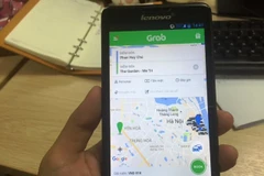 Ứng dụng phần mềm gọi xe của Grab. (Ảnh: Việt Hùng/Vietnam+)