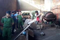 Chế biến càphê bẩn tại cơ sở của bà Nguyễn Thị Thanh Loan bị cơ quan chức năng tỉnh Đắk Nông phát hiện. (Ảnh: TTXVN)