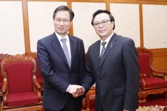 Trưởng Ban Đối ngoại Trung ương Hoàng Bình Quân tiếp Tổng Thư ký ICAPP Park Ro-byug. (Ảnh: Lâm Khánh/TTXVN)