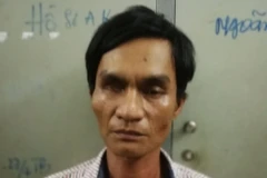 Đối tượng Kim Thành Hưng tại cơ quan công an. (Ảnh: Cơ quan công an cung cấp)