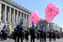 Đội kèn biểu diễn tại lễ diễu hành. (Nguồn: THX/TTXVN) 