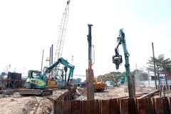 Thi công Dự án hầm chui nút giao thông Nguyễn Văn Linh-Nguyễn Hữu Thọ (Quận 7, Thành phố Hồ Chí Minh). (Ảnh: Tiến Lực/TTXVN) 