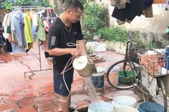 Người dân ở Sóc Sơn đang phải sử dụng nguồn nước giếng khoan để ăn uống và sinh hoạt. (Nguồn: moitruong.net.vn) 
