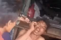 Cảnh ngư dân bị đánh đập dã man. (Ảnh cắt từ clip. Nguồn: TTXVN phát)
