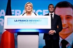 Chủ tịch đảng Tập hợp Quốc gia (RN) của Pháp Marine Le Pen (trái) phát biểu tại Paris, ngày 9/6/2024. (Ảnh: Getty Images/TTXVN)