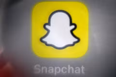 Biểu tượng ứng dụng tin nhắn ảnh Snapchat. (Ảnh: AFP/TTXVN)