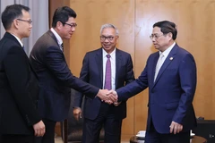 Thủ tướng Phạm Minh Chính tiếp doanh nghiệp Indonesia. (Ảnh: Dương Giang/TTXVN)