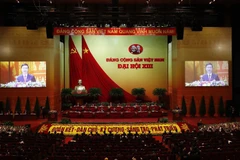 Đại hội nghe đồng chí Võ Văn Thưởng, Trưởng ban Tuyên giáo Trung ương thay mặt Đoàn Chủ tịch báo cáo kết quả bầu cử Bộ Chính trị, Tổng Bí thư, Ban Bí thư, Ủy ban Kiểm tra Trung ương, Chủ nhiệm Ủy ban Kiểm tra Trung ương khóa XIII. (Nguồn: TTXVN)