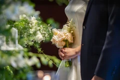 Dịch vụ hủy ảnh cưới đang hút khách nhờ tỷ lệ ly hôn ngày càng gia tăng. (Nguồn: Yonhap)