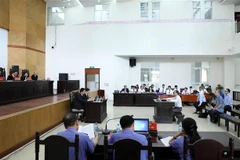 Các bị cáo tại phiên tòa. (Ảnh: Phạm Kiên/TTXVN) 