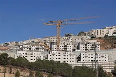 Công trình xây dựng một khu định cư của Israel ở Bờ Tây. (Ảnh: AFP/TTXVN)