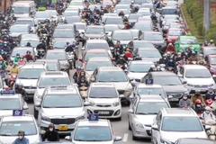 [Photo] Giao thông Hà Nội ngày đầu tuần trong thời tiết rét đậm