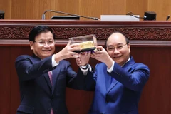 Hình ảnh Chủ tịch nước dự Lễ bàn giao Tòa Nhà Quốc hội mới cho Lào