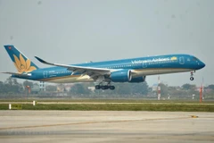Máy bay Vietnam Airlines cất cánh tại sân bay Nội Bài. (Ảnh: CTV/Vietnam+) 