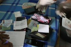 Tang vật vụ án. (Ảnh: Đậu Tất Thành/TTXVN) 