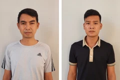 Hai trong số các đối tượng liên quan đến đường dây tổ chức đánh bạc và đánh bạc thông qua hệ thống game bài đổi thưởng Rikvip do Nguyễn Văn Dương và Phan Sào Nam cầm đầu. (Ảnh: TTXVN phát) 